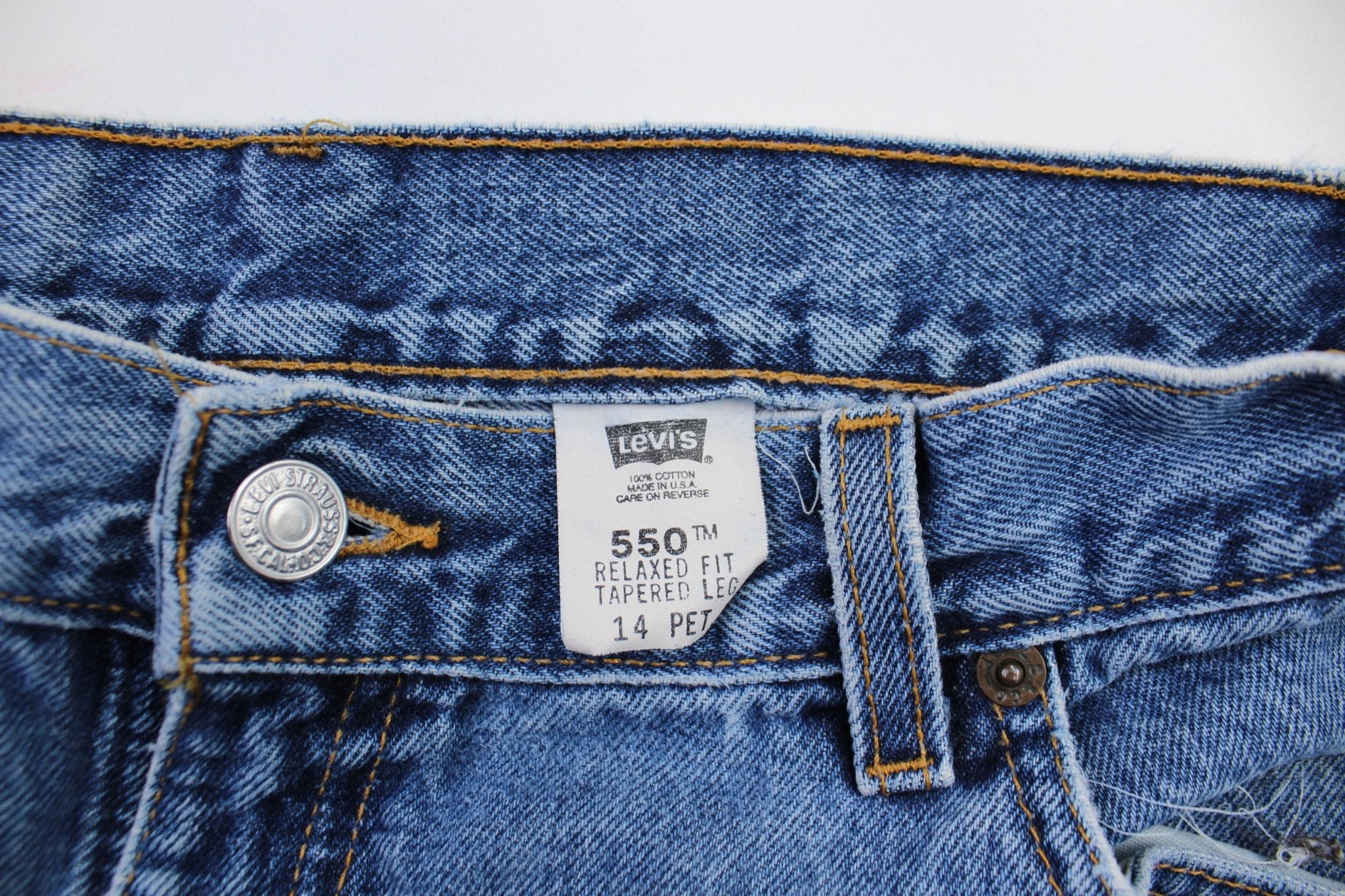 Levi's Red Tab Medium Wash Denim Jeans - ThriftedThreads.com