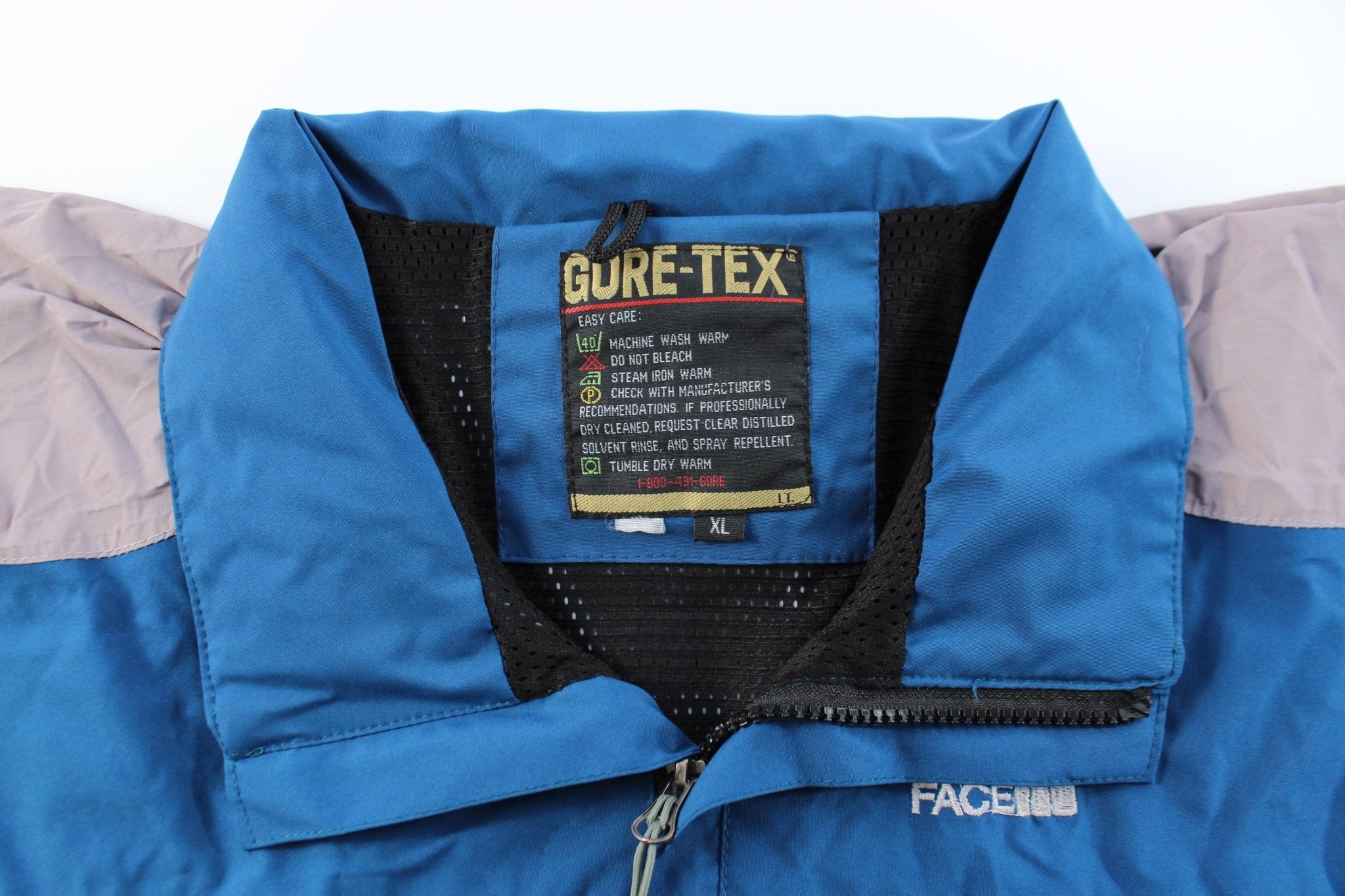 The North Face Embroidered Logo Blue & Grey Goretex Jacket - ThriftedThreads.com