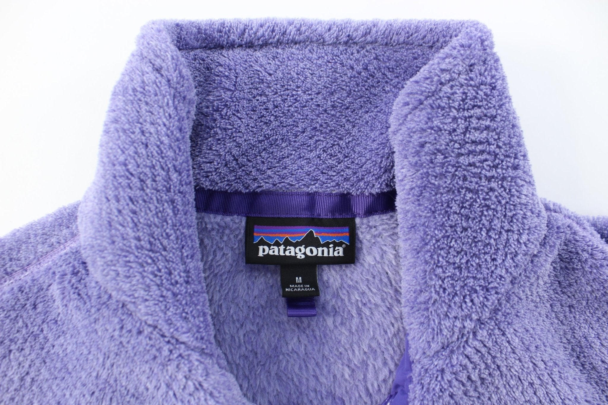 Women's Patagonia Logo Patch Purple Fleece Pullover - ThriftedThreads.com