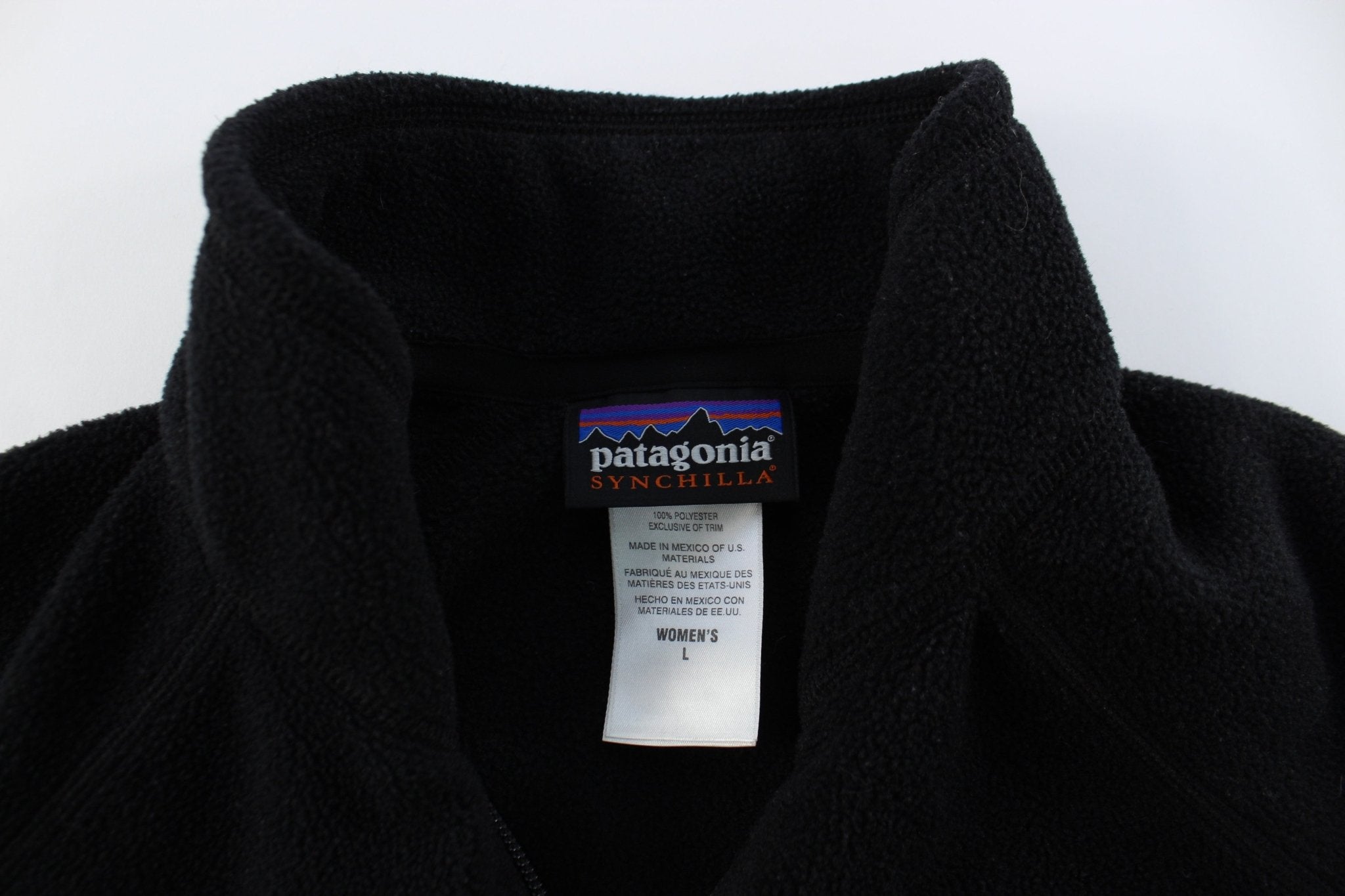 Women's Patagonia Synchilla Logo Patch Black Zip Up Vest - ThriftedThreads.com